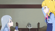 two anime girls are standing next to each other in a bedroom