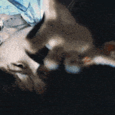 a close up of a person laying on their back
