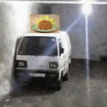 a white van with a picture of food on the top of it