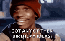 a man wearing a red hat says got any of them birthday ideas ?