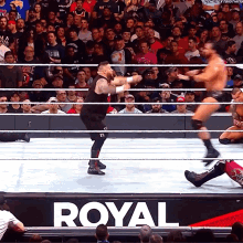 Kevin Owens Pop Up Powerbomb GIF - Kevin Owens Pop Up Powerbomb Drew Mc Intyre GIFs