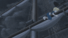 a person is hanging from a rope on a boat