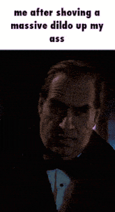 a man in a tuxedo has glowing eyes and a caption that says me after shoving a massive dildo up my ass