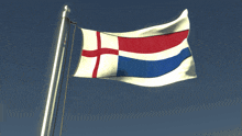 a red white and blue flag is waving in the wind against a blue sky