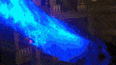 a video game character with a bloody arm is holding a gun