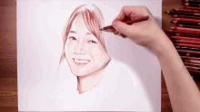 a person is drawing a woman 's face with colored pencils that say prismacolor