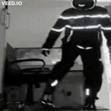 a black and white photo of a person with the word veed.io on the bottom left