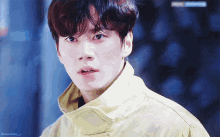 a close up of a man 's face with the words favorhello_j written on the bottom