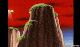 a cartoon of a mountain with a red sky in the background