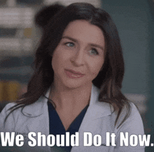 a woman in a lab coat with the words we should do it now