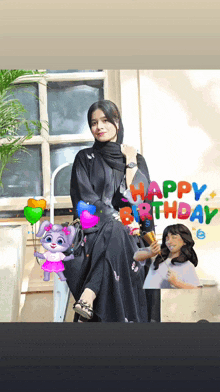 a woman in a black dress is surrounded by balloons and a happy birthday message