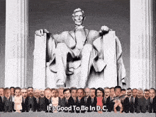 a group of people are standing in front of a lincoln statue with the words it 's good to be in d.c.
