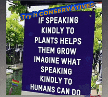 a blue sign that says " try it conservatives " on it