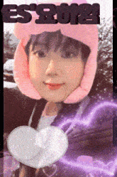 a girl wearing a pink hat with the year 2018 written on it