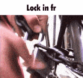 a picture of a person locking a bike with the words lock in fr