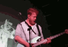 Mumford And Sons Ted Dwane GIF - Mumford And Sons Ted Dwane Playing Guitar GIFs