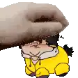 a hand is petting a cartoon character with glasses and a yellow jacket .