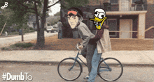 a cartoon of two people riding a bicycle with the hashtag #dumbto