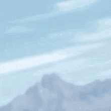a blurry picture of a person with a blue hood