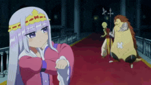 a girl in a pink dress is standing on a red carpet next to a skeleton .