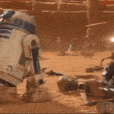 a group of robotic soldiers are fighting each other in a desert .
