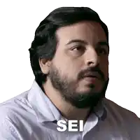 a man with a beard and the word sei written on his face