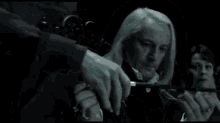Lucius Malfoy Narcissa Malfoy GIF - Lucius Malfoy Malfoy Narcissa Malfoy GIFs