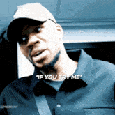 a man wearing a hat and a shirt says " if you try me "