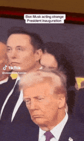 elon musk acting strange president inauguration with donald trump behind him