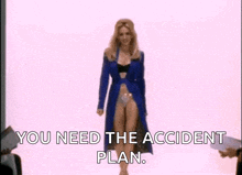 a woman is walking down a runway with the words " you need the accident plan " behind her .