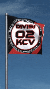 a black and red flag with the words divisi 02 kcv on it
