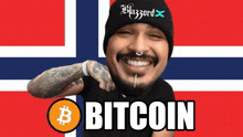 a man wearing a hat that says blazzard on it stands in front of a norwegian flag