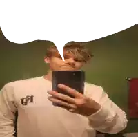 a man taking a selfie with a speech bubble above him
