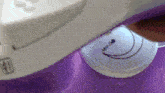 a close up of a purple and white iron with the number 40 on it