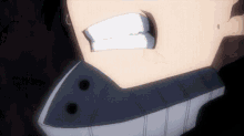 a close up of a person 's mouth with a black and white mask on .