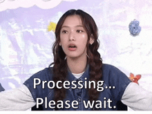 a woman says " processing please wait " in front of a purple background