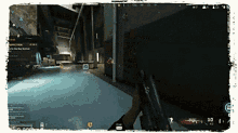 a person holding a gun in a video game with the number 10 on the bottom right