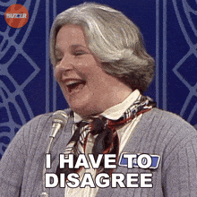 a woman is laughing and says i have to disagree