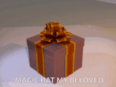 a gift box with a bow and the words magic bat my beloved below it