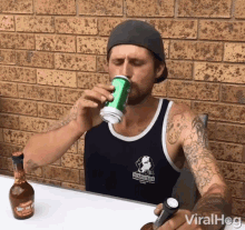 a man drinking from a can next to a bottle of beer that says knock the bock