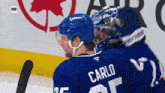 a hockey player with the name carlo on the back of their jersey