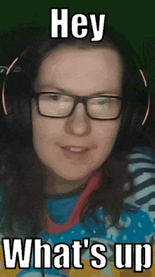 a woman wearing glasses and headphones says " hey what 's up "