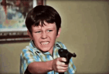 pissed off angry kid with gun