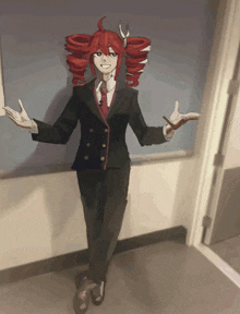 a girl with red hair is wearing a black suit