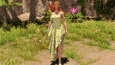 a woman in a yellow dress is standing in a field