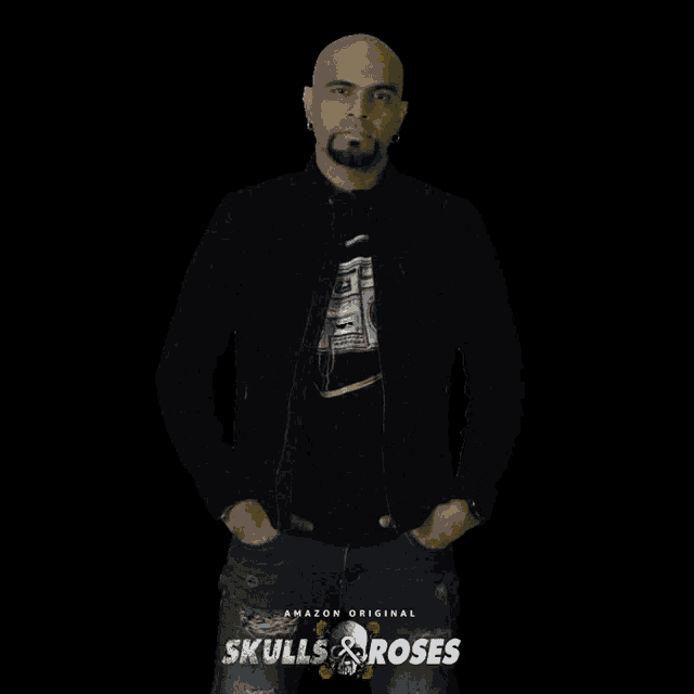 a man in a black jacket stands in front of a black background with abe ch *** ye written on it