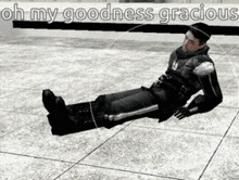 a man is laying on the ground with the words oh my goodness gracious