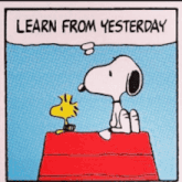 a cartoon of snoopy and woodstock sitting on a box that says learn from yesterday