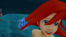 a cartoon of ariel from the little mermaid is standing in the water .