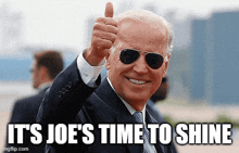 joe biden giving a thumbs up with the words it 's joe 's time to shine behind him